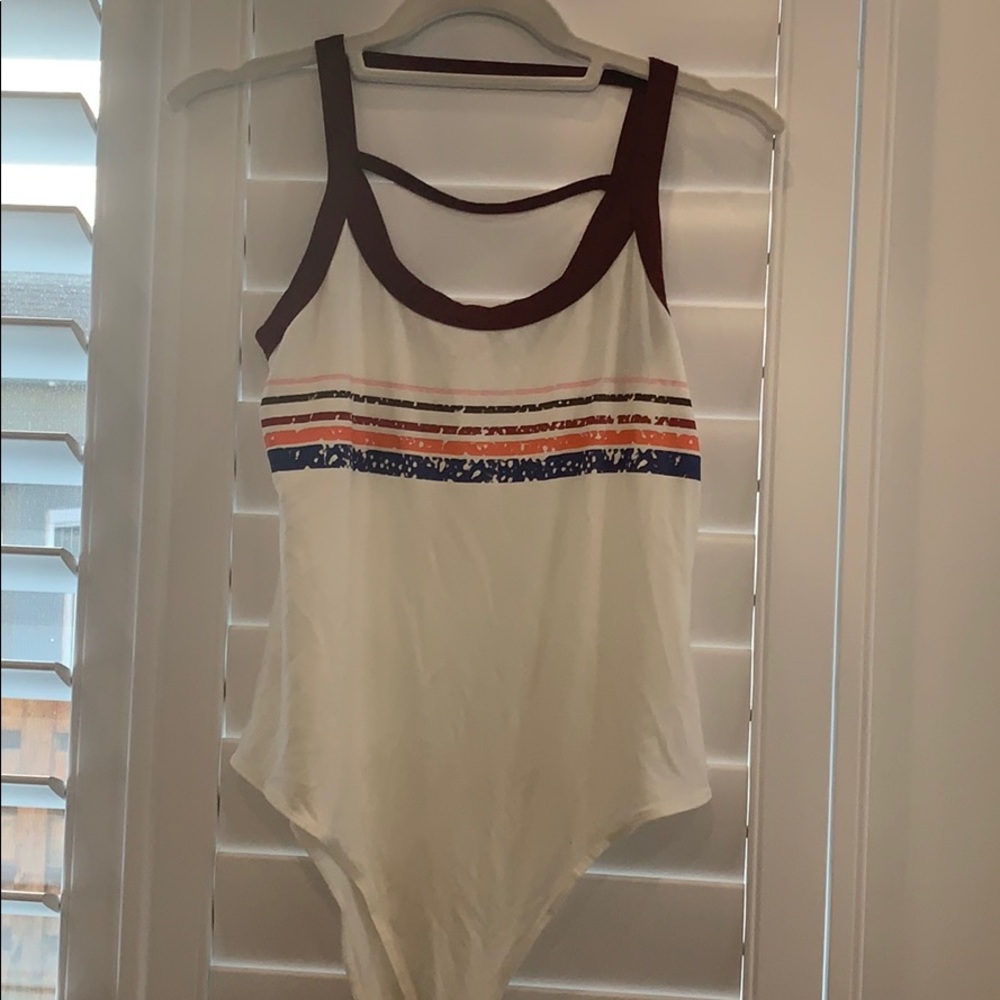 Hem and thread body suit